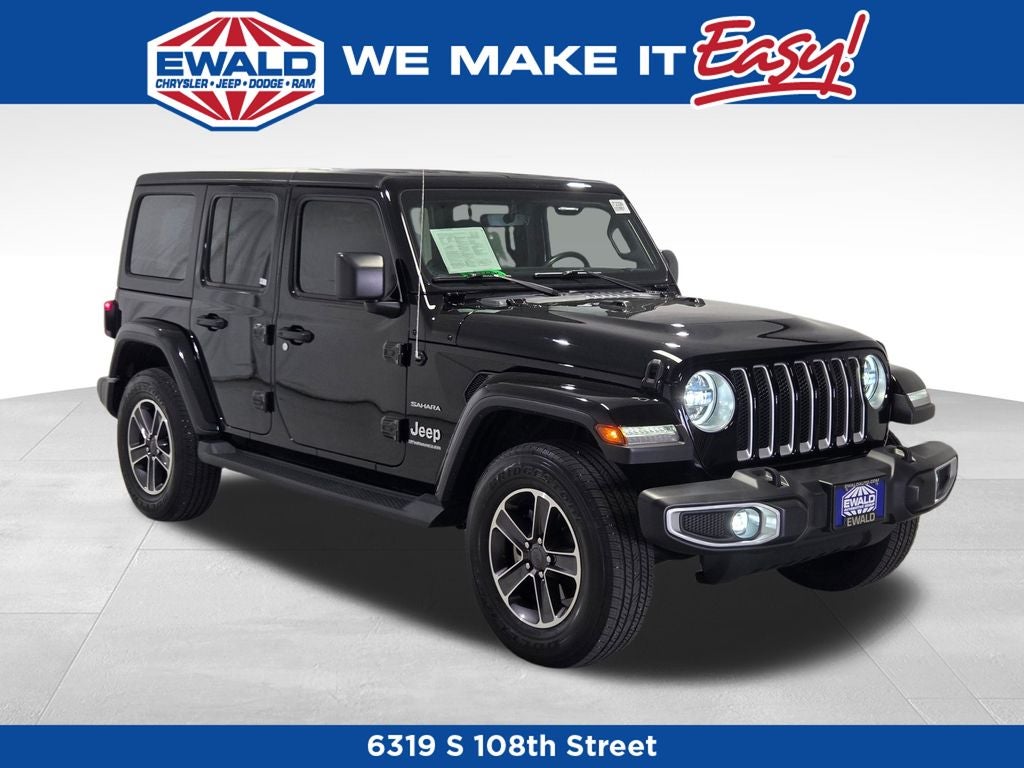 2023 Jeep Wrangler Sahara in Black Clearcoat — front three-quarter view