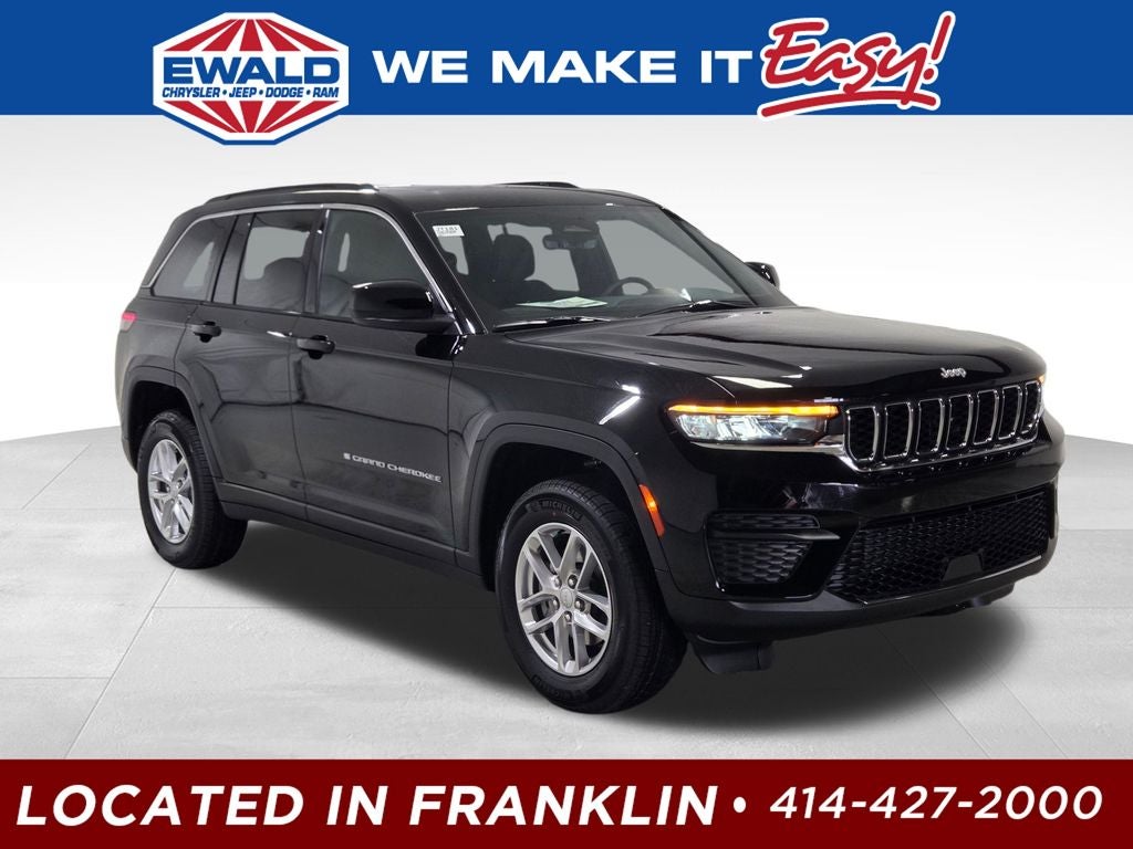 2026 Jeep Grand Cherokee Laredo X in Diamond Black Crystal Pearl-Coat Exterior Paint — front three-quarter view