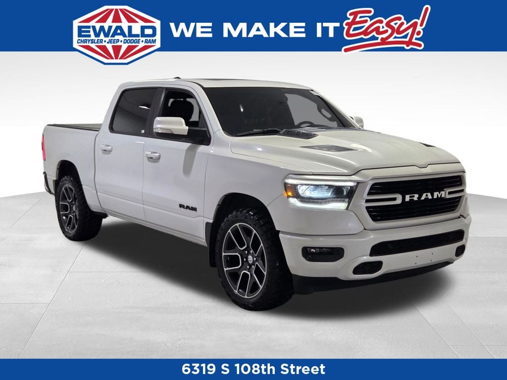2019 RAM 1500 SPORT in Ivory Tri-Coat Pearl — front three-quarter view
