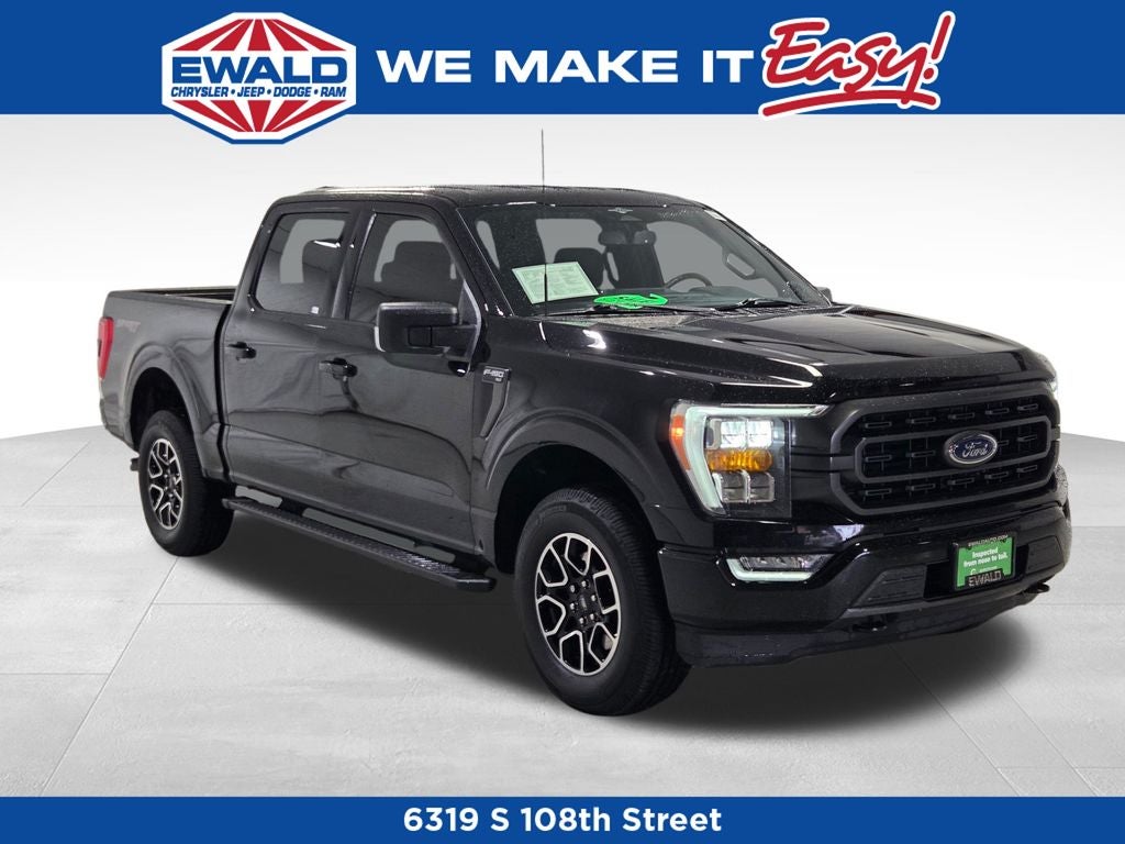 2023 Ford F-150 XLT in Black Metallic — front three-quarter view